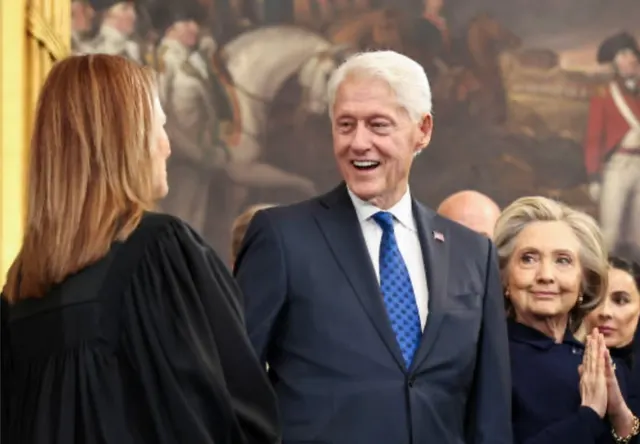 Bill Clinton Laughing While Hillary Watches meme template
